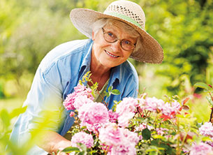 A woman gardening. Link to Life Stage Gift Planner Over Age 70 Situations.